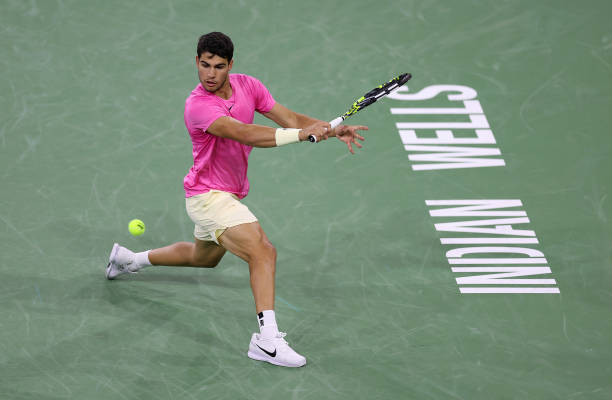 Carlos Alcaraz of Spain in action against Jack Draper of Great Britain after he retired injured during BNP Paribas Open on March 14, 2023 in Indian...