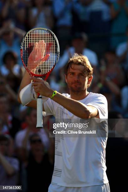 Mardy Fish of the USA celebrates after winning his Gentlemen's Singles second round match against James Ward of Great Britain on day four of the...