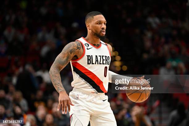 Damian Lillard of the Portland Trail Blazers dribbles during the first quarter against the New York Knicks at Moda Center on March 14, 2023 in...