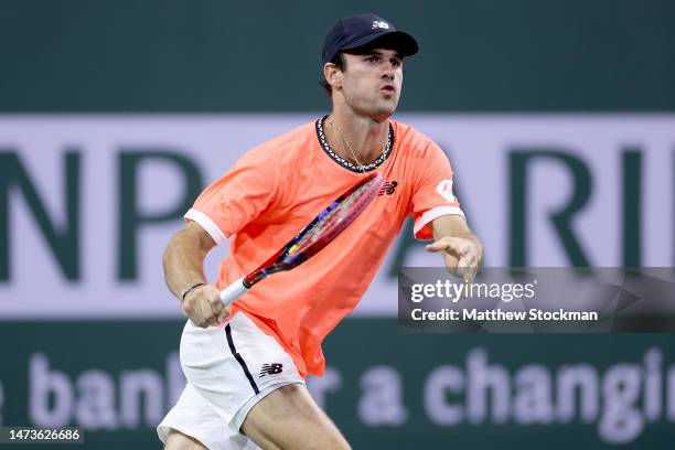 Tommy Paul plays Felix Auger-Aliassime of Canada during the BNP Paribas Open at the Indian Wells Tennis Garden on March 14, 2023 in Indian Wells,...
