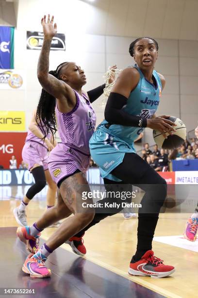 Kayla Thornton of the Flyers handles the ball against Tiffany Mitchell of the Boomers during the round three WNBL match between Southside Flyers and...