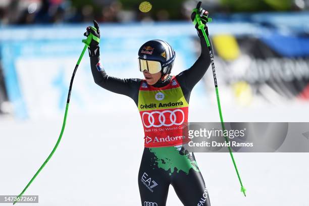 Sofia Goggia of Italy celebrates after crossing the finish line in the Women's Downhill during the Audi FIS Alpine Ski World Cup Finals on March 15,...