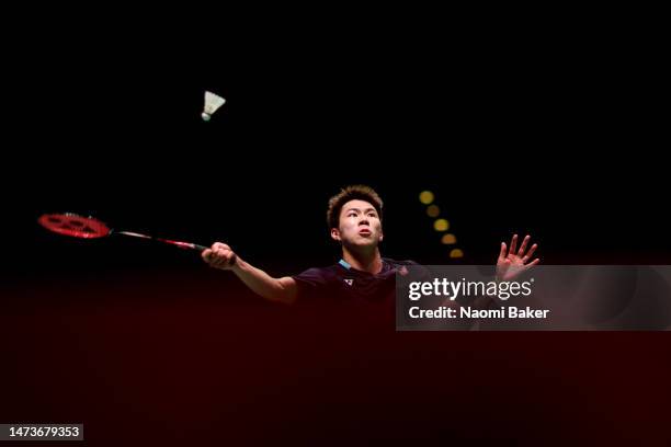 Lee Cheukyiu of Hong Kong in action during his Men's first round singles match against Viktor Axelsen of Denmark during Day One of the Yonex All...