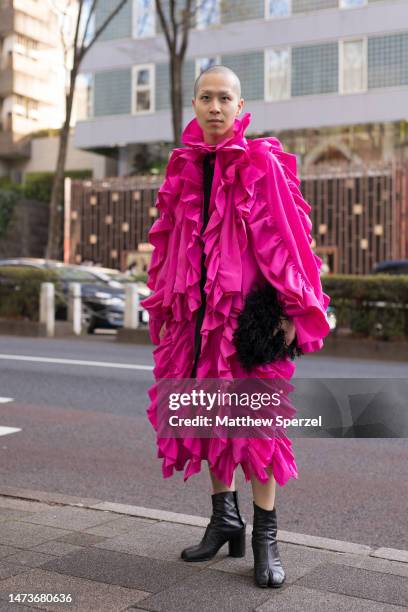 Guest is seen wearing pink Viviano outfit attending HEoS in Omotesando at Rakuten Fashion Week TOKYO 2023 A/W on March 15, 2023 in Tokyo, Japan.