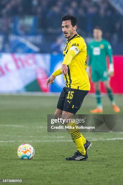 Mats Hummels of Dortmund runs with the ball during the Bundesliga match between FC Schalke 04 and Borussia Dortmund at Veltins-Arena on March 11,...