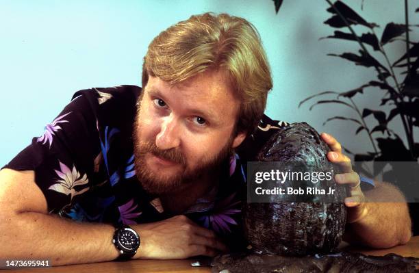'Alien 2' Producer James Cameron with prop from the movie, July 16, 1986 in Los Angeles, California.