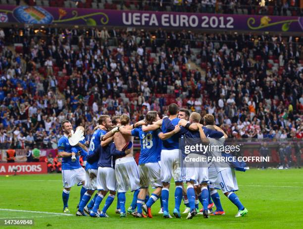 Italy's national football team celebrate their victory at the end of the Euro 2012 football championships semi-final match Germany vs Italy on June...