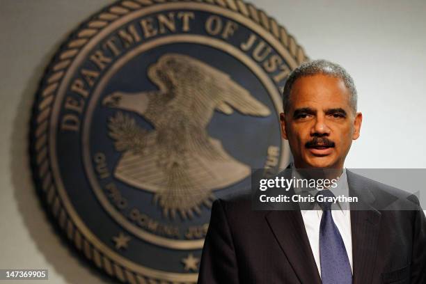 Attorney General Eric Holder addresses the media following a vote in the House of Representatives at the U.S. Attorney's Office Eastern District of...