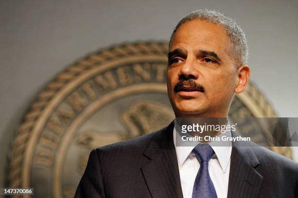 Attorney General Eric Holder addresses the media following a vote in the House of Representatives at the U.S. Attorney's Office Eastern District of...
