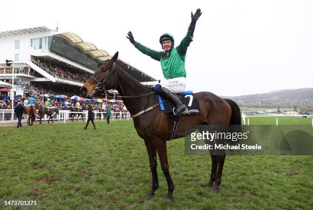 Paul Townend riding Impaire Et Passe celebrates winning the Ballymore Novices' Hurdle during day two of the Cheltenham Festival 2023 at Cheltenham...