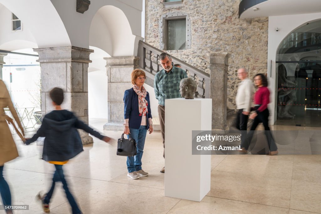 Senior Female and Male Museum Visitors