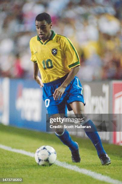 Denilson, Forward for Brazil dribbles the football along the sideline during the Group A match against Guatemala at the 1998 CONCACAF Gold Cup on 5th...