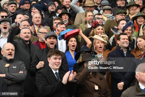 Pizza-loving racegoer attends Cheltenham Festival wearing a Domino's pizza inspired fascinator, at Cheltenham Racecourse on March 15, 2023 in...