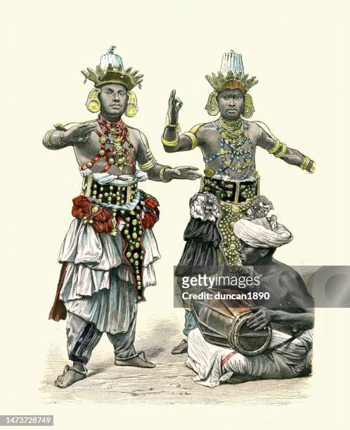 traditional devil dancers in sri lanka, history of fashion, 1880s 19th century - sri lankan culture stock illustrations