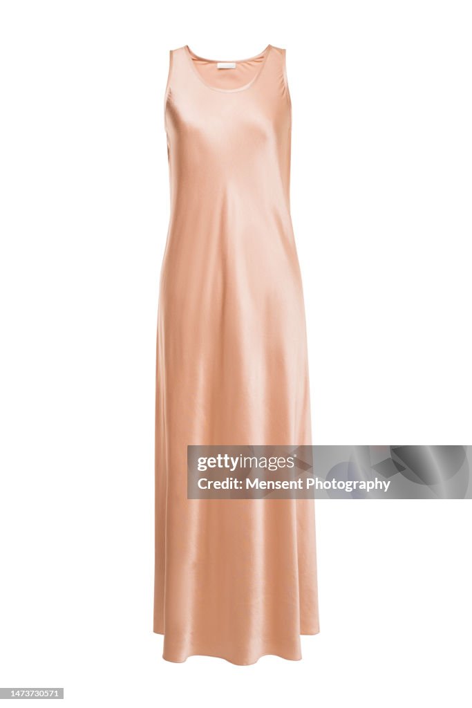Fashionable womans silk festive beige dress isolated in white background, invisible mannequin