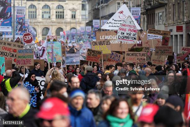 Demonstrators at a protest during a national strike against pension reform on March 15, 2023 in Lille, France.