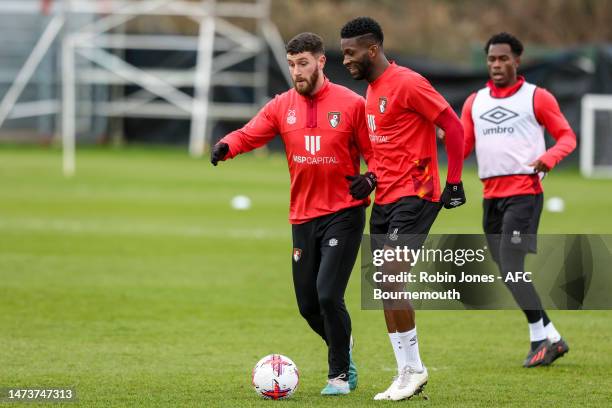 Marcos Senesi and Jefferson Lerma of Bournemouth during a training session at Vitality Stadium on March 15, 2023 in Bournemouth, England.