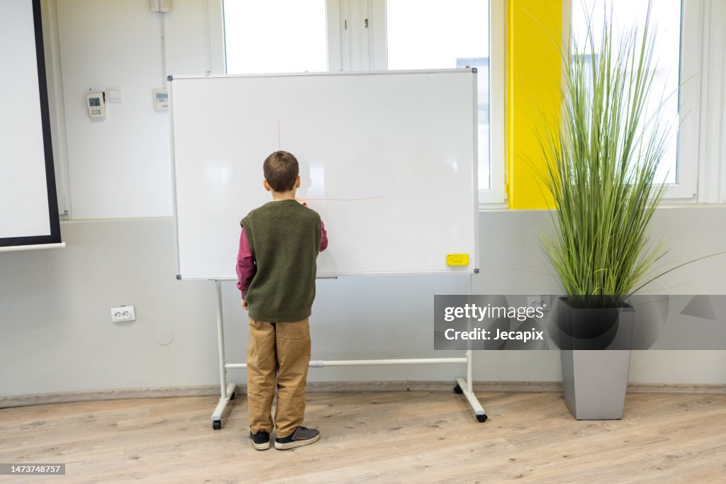Doing Math Stock Young Boy Doing Math High-Res Stock Photo - Getty Images