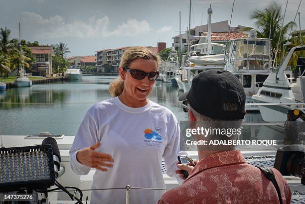 British-born Australian World Champion Marathon Swimmer and world record in open water swimming, Penny Palfrey , talks to the press in Havana on June...