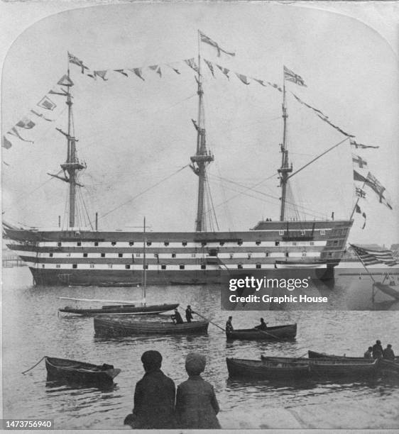 Royal Navy 104-gun first-rate ship HMS Victory in Portsmouth, Hampshire, England, 26th June 1897. Victory is best known for her role as the flagship...
