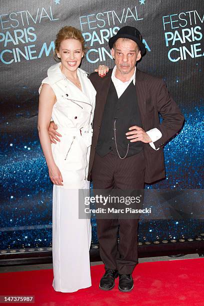 Kylie Minogue and Denis Lavant attend the "Holy Motors" Premiere as part of the Opening Ceremony of Paris Cinema 10th Anniversary at Cinema Gaumont...