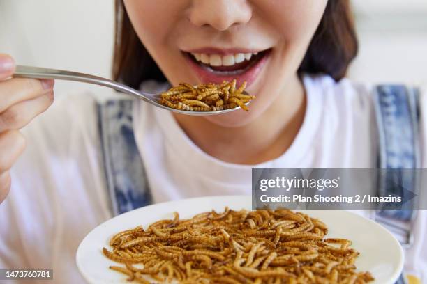 Woman Eating Insect 62 Woman Eating Insects Stock Photos, High-Res Pictures, and Images ...