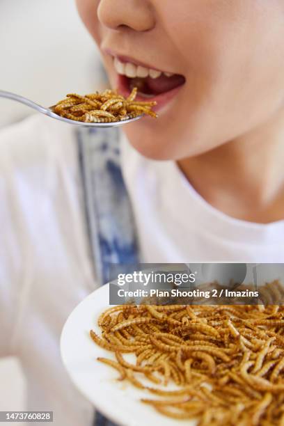 Woman Eating Insect 62 Woman Eating Insects Stock Photos, High-Res Pictures, and Images ...