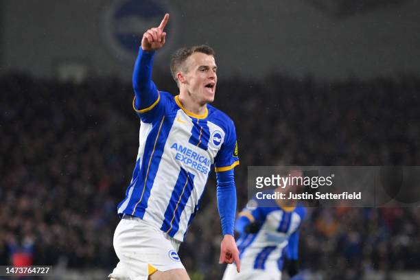 Solly March of Brighton & Hove Albion celebrates after scoring the team's first goal during the Premier League match between Brighton & Hove Albion...