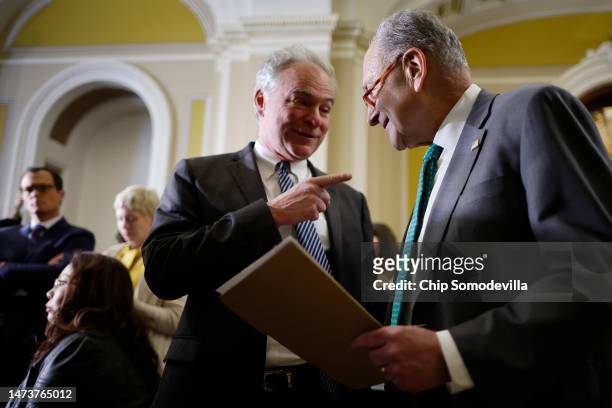 Sen. Tim Kaine and Senate Majority Leader Charles Schumer talk during a news conference following the weekly Democratic Senate policy luncheon at the...