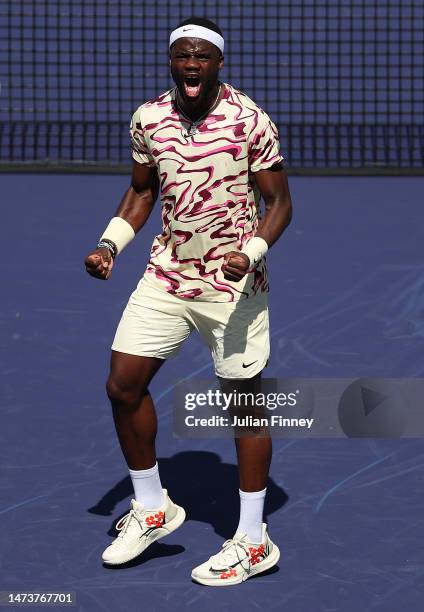 Frances Tiafoe of USA celebrates defeating Cameron Norrie of Great Britain in the quarter finals during the BNP Paribas Open on March 15, 2023 in...