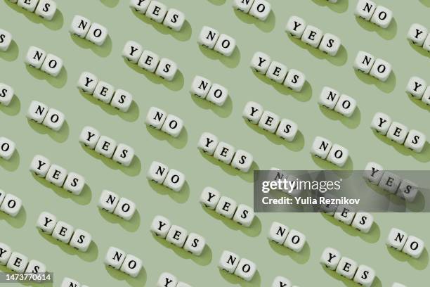words yes, no on the green background- choice concept - warning sign 3d stock pictures, royalty-free photos & images