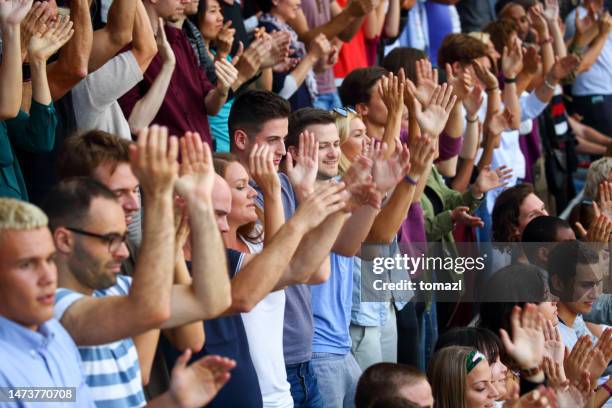 Crowd Cheer Stadium Clapping Photos and Premium High Res Pictures ...