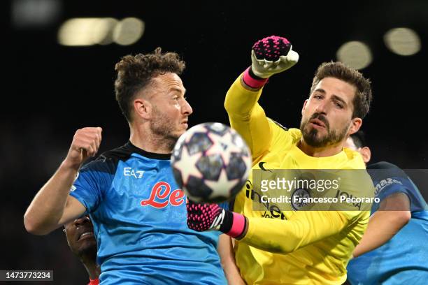 Kevin Trapp of Eintracht Frankfurt punches the ball in front of Amir Rrahmani of SSC Napoli during the UEFA Champions League round of 16 leg two...