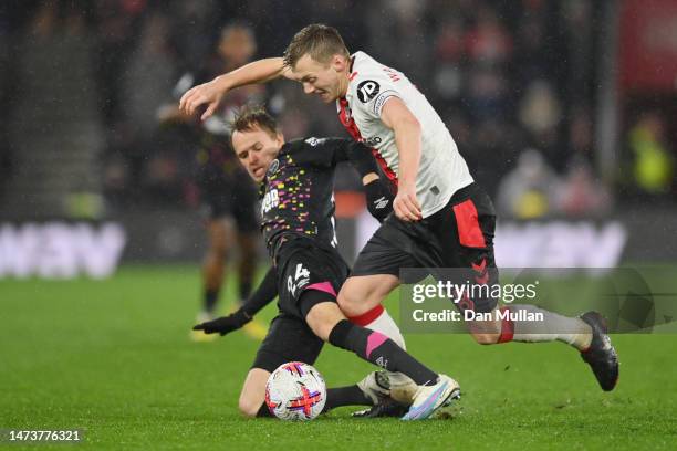 James Ward-Prowse of Southampton is challenged by Mikkel Damsgaard of Brentford during the Premier League match between Southampton FC and Brentford...