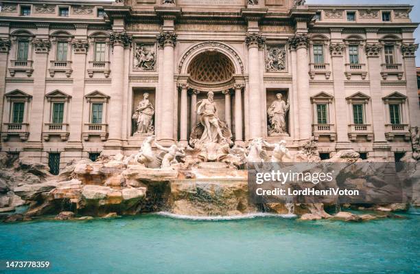 famous and one of the most beautiful fountains of rome - trevi fountain (fontana di trevi) - neptune roman god stock pictures, royalty-free photos & images