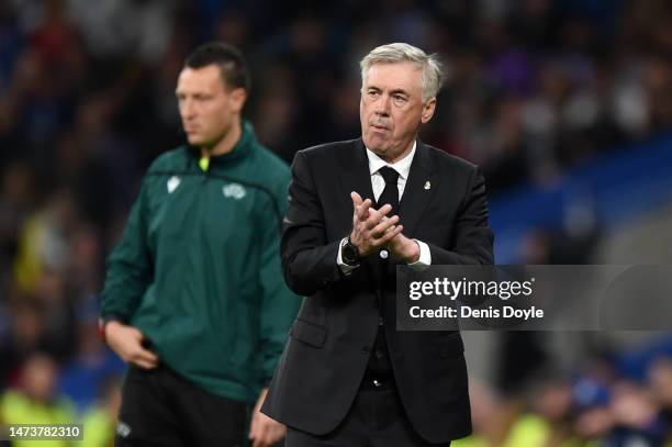 Carlo Ancelotti, Manager of Real Madrid, applauds during the UEFA Champions League round of 16 leg two match between Real Madrid and Liverpool FC at...