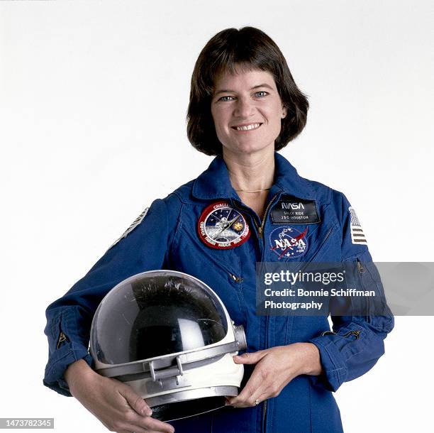Astronaut Sally Ride smiles with her helmet at her side in Los Angeles in 1986.