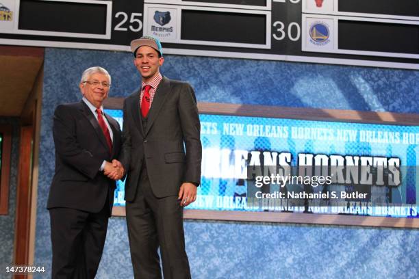 Austin Rivers shakes hands with NBA Commissioner David Stern after being selected number ten overall by the New Orleans Hornets during during the...