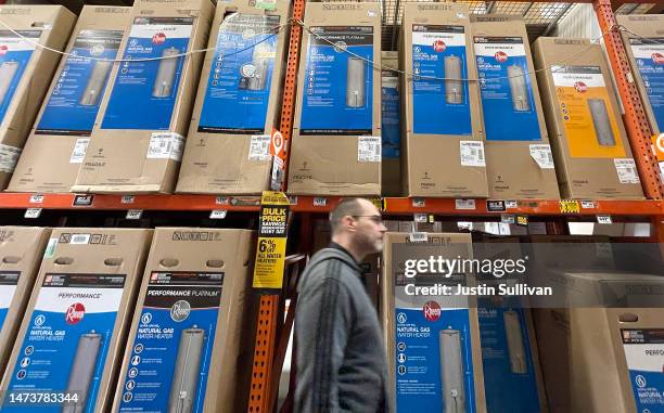 Gas powered water heaters are displayed at a Home Depot store on March 15, 2023 in San Rafael, California. The Bay Area Air Quality Management...