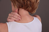 Woman touching painful back. Spine osteoporosis, Scoliosis concept