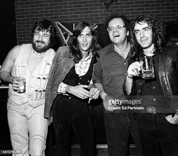 Billy Roberts, John Cipollina, Nick Gravenites and Pete Sears pose backstage at the Old Waldorf club in San Francisco, California on November 6, 1977.