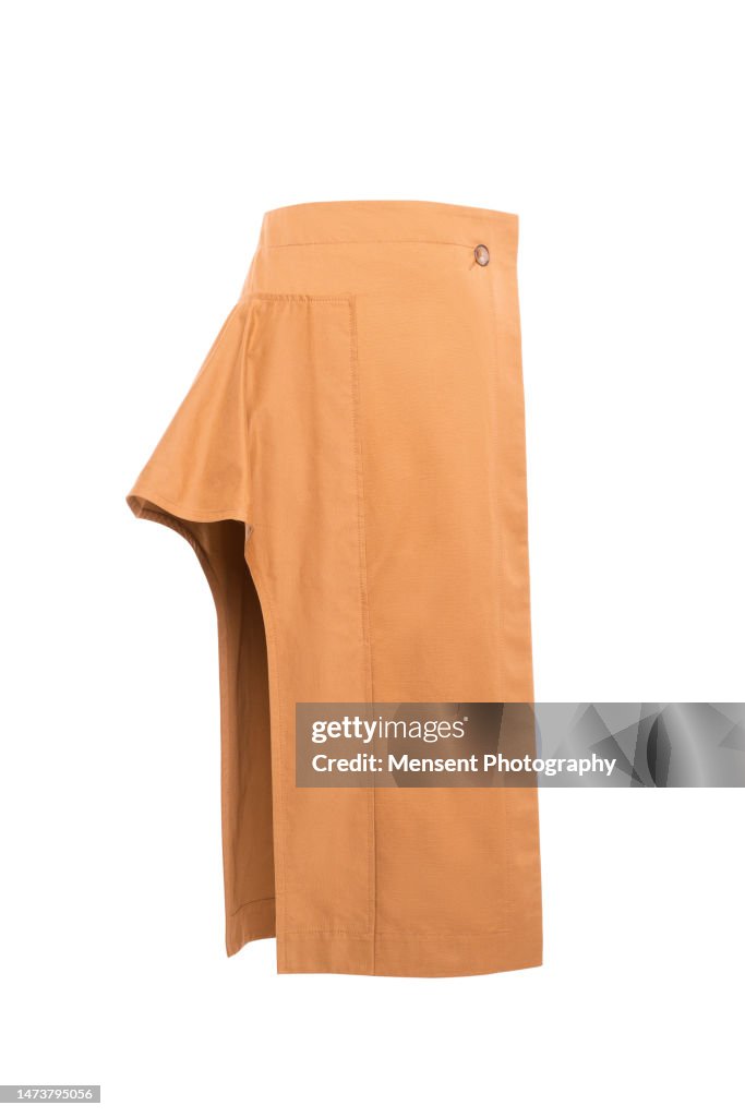 Women's fashionable vintage orange skirt isolated in white background, invisible mannequin