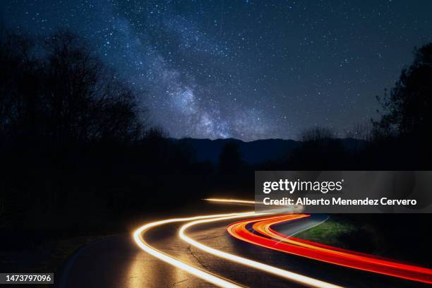 travel at night - speeding car stock pictures, royalty-free photos & images