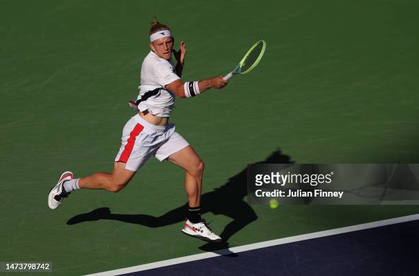 Alejandro Davidovich Fokina of Spain in action against Daniil Medvedev in the quarter finals during the BNP Paribas Open on March 15, 2023 in Indian...