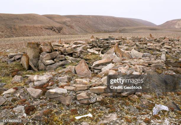 ancient thule house ruin - qaanaaq stock pictures, royalty-free photos & images