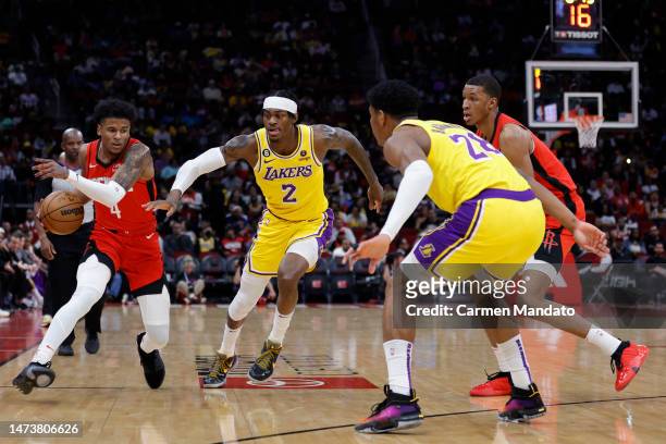 Jalen Green of the Houston Rockets controls the ball against Jarred Vanderbilt of the Los Angeles Lakers during the first half at Toyota Center on...