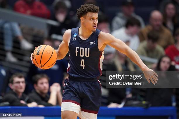 Grant Singleton of the Fairleigh Dickinson Knights looks to pass the ball against the Texas Southern Tigers during the second half in the First Four...