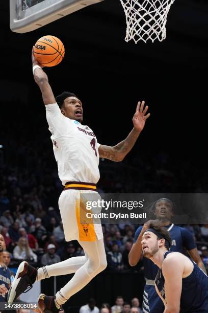 Desmond Cambridge Jr. #4 of the Arizona State Sun Devils dunks the ball against the Nevada Wolf Pack during the first half in the First Four game of...
