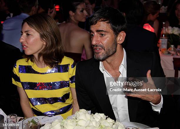 Sofia Coppola and Marc Jacobs poses during the amfAR Inspiration Night Paris at Maxim's on June 28, 2012 in Paris, France.