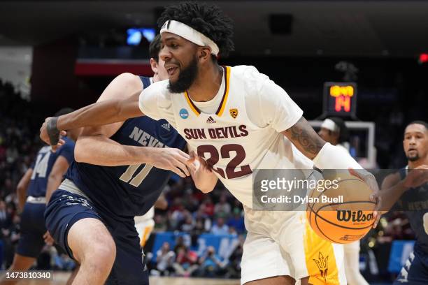 Warren Washington of the Arizona State Sun Devils drives to the basket against Nick Davidson of the Nevada Wolf Pack during the first half in the...